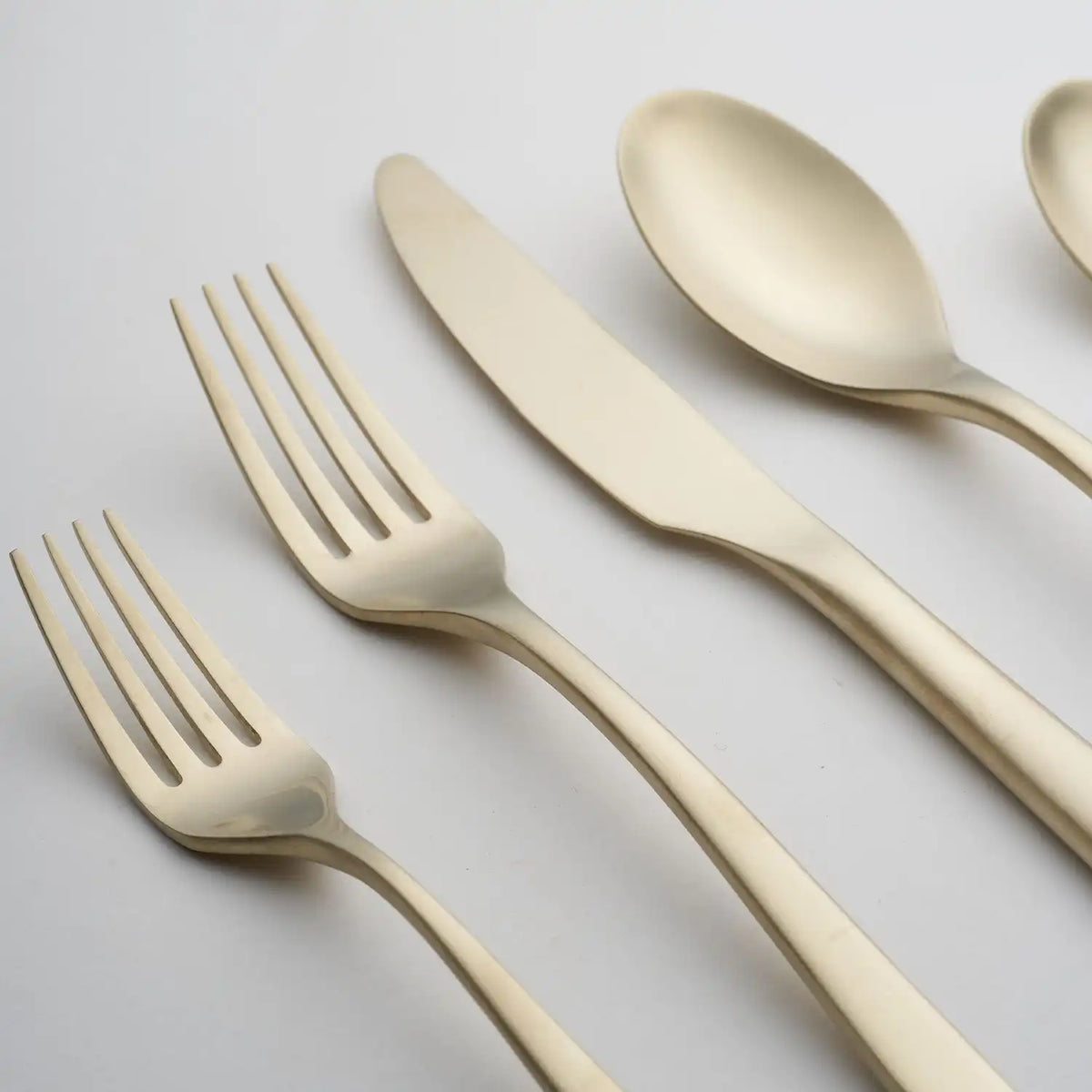 Averie Champagne Satin 20-Piece Flatware Set